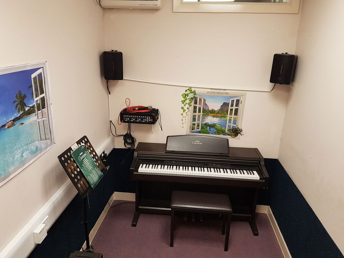 studio 20 solo room with piano